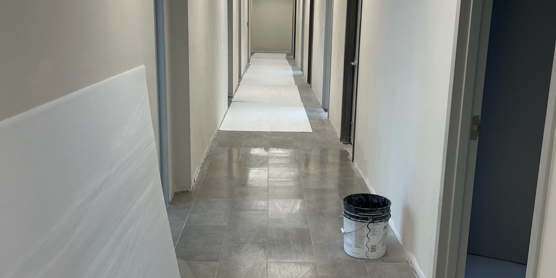 Commercial corridor being painted and finished by GM 5.0 Construction